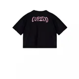 Remera crop negra de manga corta con cuello redondo. Presenta un estampado frontal con la palabra "FUTTTURA" en tipografía universitaria con efecto brillante y la firma "Tini" debajo.