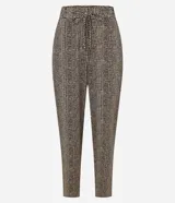 Pantalón fluido de cintura alta confeccionado en crepé con elástico y lazo en la cintura, bolsillos, recortes y estampado de lunares diferenciado.