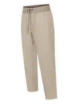 Pantalón de lino color beige, con pretina de jersey ajustable, calce regular, bolsillos en el frente y trasero.