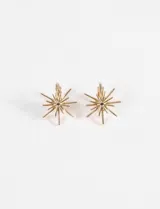 Par de aros dorados con forma de estrella fugaz con cierre a clip.