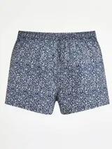 Bóxer de algodón con cintura elástica y estampado abstracto en tonos turquesa, negro y salmón/naranja.