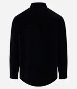 Camisa blanca de manga larga, confeccionada en terciopelo con cuello clásico y bolsillos frontales.