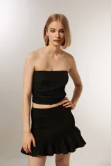 Top strapless negro con lurex y frunces.