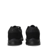 Championes urbanos Umbro color blanco con detalles en negro, confeccionados en cuero sintético y tela.