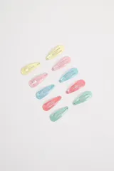 Pack de diez hebillas para el pelo tipo pico de pato, en colores pastel: amarillo, rosa, celeste y verde agua.