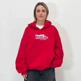 Buzo hoodie negro de felpa con calce boxy fit y estampa frontal con el texto "Feeling" en blanco.