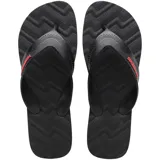 Ojotas Havaianas Track Waves color negro con logo rojo en la tira. Suela con diseño geométrico en relieve.