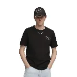 Remera negra de manga corta con cuello redondo y logo Puma Athletics estampado en el pecho.