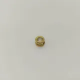Dije de oro amarillo 18k con circonia engarzada.