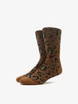 Medias marrones con estampado de leopardo en tonos negro y verde.