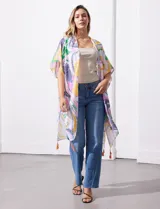 Kimono tejido con mangas amplias japonesas y terminación de ruedo con borlas.