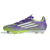 Championes de fútbol Adidas F50 League Fg/mg, color violeta con detalles en verde flúor y las tres tiras características de la marca en color plateado.
