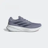 Championes de running Adidas Supernova Ease color gris con detalles en azul y negro. Presentan las tres tiras características de la marca en los laterales y suela blanca con tecnología Dreamstrike.