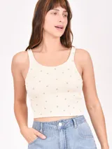 Musculosa negra de algodón con estampado de estrellas blancas.