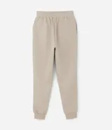 Pantalón jogger color amarillo claro, con cintura elástica y cordón de ajuste. Confeccionado en algodón con forro de polar.