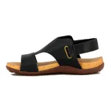 Sandalia de mujer con diseño cerrado en la parte delantera, combinando cuero verde oliva y cuero marrón claro. Posee tira ajustable con velcro en el talón y suela de goma con plantilla de corcho.