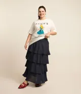 Pollera midi de crepé azul marino con lunares blancos, cintura elástica y volados en capas.