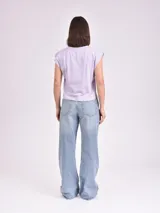 Remera color rosa con estampado de palmeras y texto "Sur la Cote D'Azur France Saint Jean Cap Ferrat".