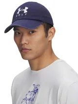 Gorra de golf Under Armour color azul marino con logo bordado en blanco y visera curva.