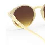 Lentes de sol Izipizi modelo D SUN, con montura redonda color beige y lentes marrones con filtro UV categoría 3.