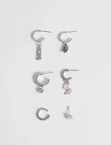 Set de seis pares de caravanas, incluyendo dijes en forma de corazón y detalles de colores.