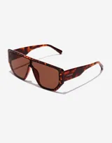 Gafas de sol unisex Hawkers modelo Metro, con montura marrón carey y lentes marrones.