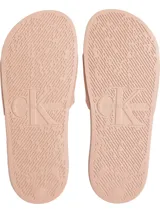 Ojotas rosadas con logo CK en la tira superior.