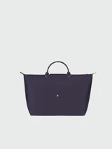 Bolso de viaje plegable de Longchamp con cierre y asas cortas, ideal para uso diario.