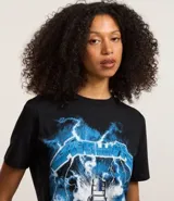 Remera negra de algodón con estampado del álbum "Ride the Lightning" de la banda Metallica.