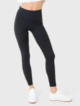 Calza larga negra de lycra con cintura alta y logo estampado en la pierna.