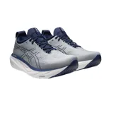 Championes de running Asics Gel-Nimbus 25, color blanco con detalles en negro, rojo y celeste.