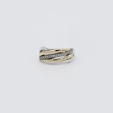 Anillo de plata con detalles en oro y circonias.