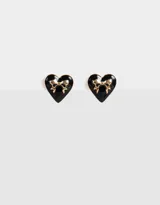 Par de aros pasantes con forma de corazón esmaltado en negro y moño dorado.