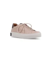 Zapatillas Hush Puppies color beige con cordones y suela blanca.