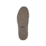 Zapatillas de skate color negro con detalles en marrón y suela blanca, diseño clásico y cómodo.