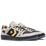 Championes Converse As-1 Pro Ox color beige con detalles en azul marino y amarillo. Confeccionados en gamuza y tela Cordura.