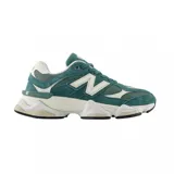 Championes urbanos New Balance modelo 9060, color verde azulado con detalles en blanco, confeccionados en gamuza y malla, con logo "N" característico en los laterales y entresuela con tecnología ABZORB y SBS.