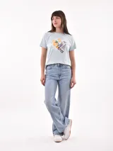 Remera lila con estampado frontal con la frase "Gracias por nada".