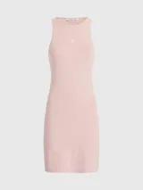 Vestido corto de punto milano color rosa pálido, de corte ajustado y sin mangas. Presenta espalda deportiva con panel recortado, cremallera lateral oculta y logo monograma de Calvin Klein estampado en el pecho.