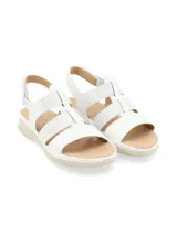 Sandalia negra con tiras de cuero y elástico con glitter, suela liviana y anatómica, tira trasera con velcro para ajuste.