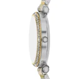 Reloj Fossil para mujer, modelo Carlie, con caja redonda dorada con borde de strass, esfera verde con agujas doradas y números romanos en dorado a las 12 y a las 6. La pulsera es de acero inoxidable combinada en plateado y dorado.