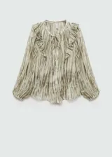 Blusa de tejido fluido con cuello redondo y cierre delantero con botones. Diseño estampado y mangas largas.