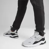Championes Puma Anzarun 2.0 blancos con detalles en azul y negro.