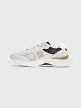 Zapatillas Tommy Hilfiger Modern Prep de running, color blanco con detalles en gris y logo TH en el lateral. Confeccionadas en gamuza y poliéster reciclado.