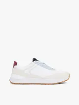 Zapatillas Tommy Hilfiger blancas con detalles en azul, rojo y suela color caramelo.