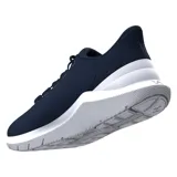 Championes de running Under Armour Phade RN 3, color azul con logo verde flúor y suela blanca.
