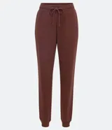 Pantalón jogger verde militar de algodón, con cintura elástica ajustable con cordón, bolsillos laterales y puños ajustados.