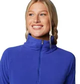 Buzo polar celeste de mujer, con cuello alto y cierre de media cremallera.