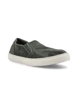Zapatillas slip-on azules de algodón orgánico con suela de caucho natural.