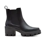 Botas Chelsea color hueso, con elásticos laterales, suela track y tacón bloque de madera.
